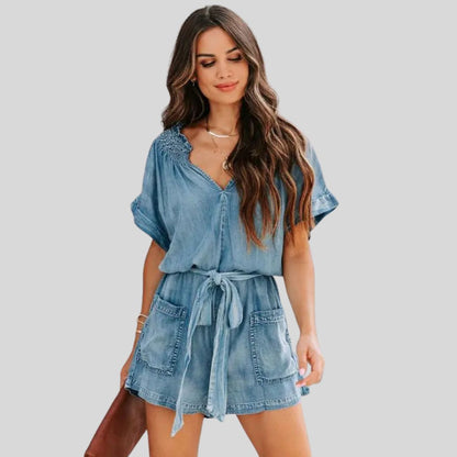 Uformell romper i denim med smockdetaljer