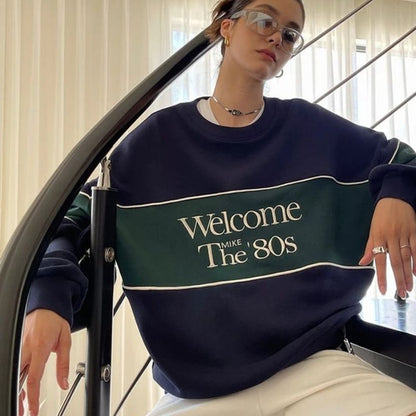 retro sweatshirt med "Welcome the 80s"-skrift