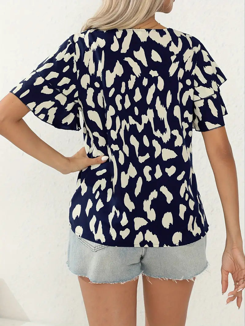 avslappet bluse med rund hals og all-over print