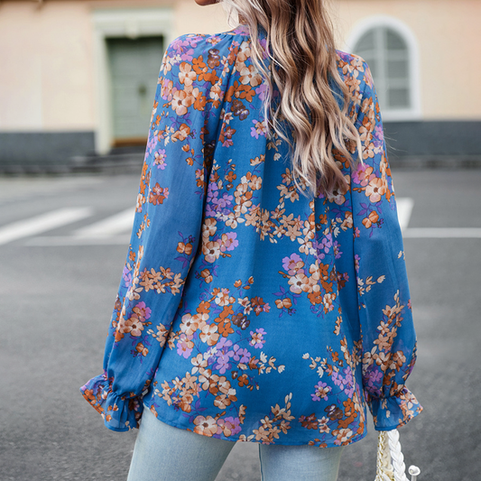 Elegant blomstrete bluse