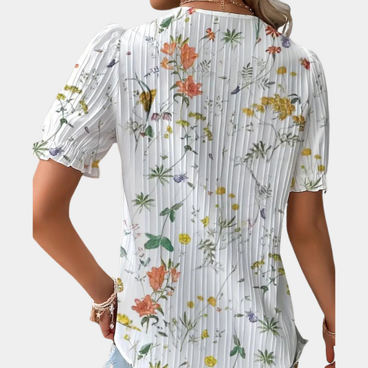 Blomstret damebluse med blondekant