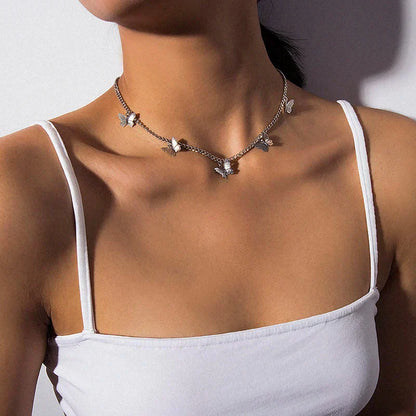 Boho choker med sommerfugl-vedheng