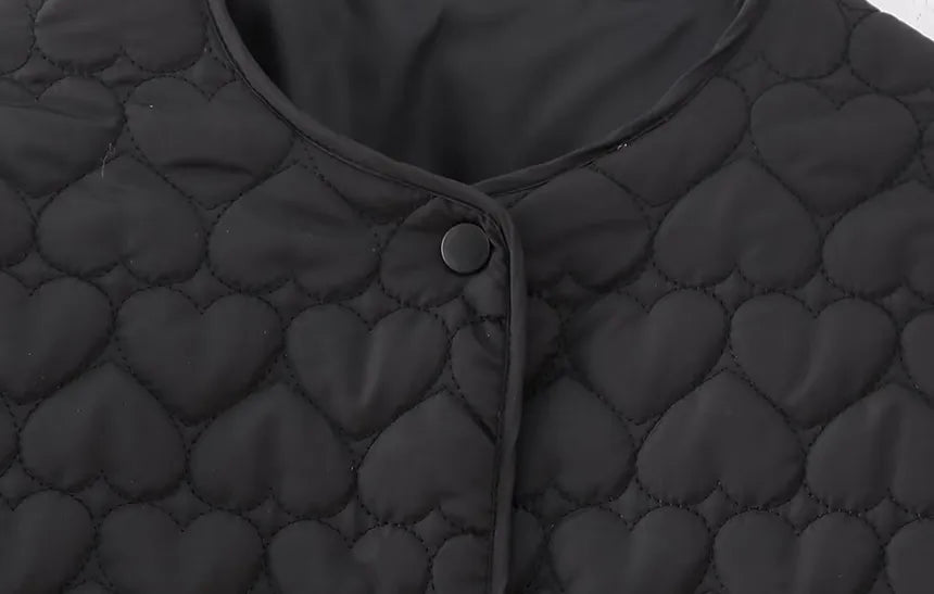 – Quilted jacket with heart motif