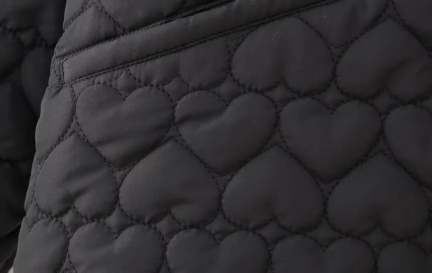 – Quilted jacket with heart motif