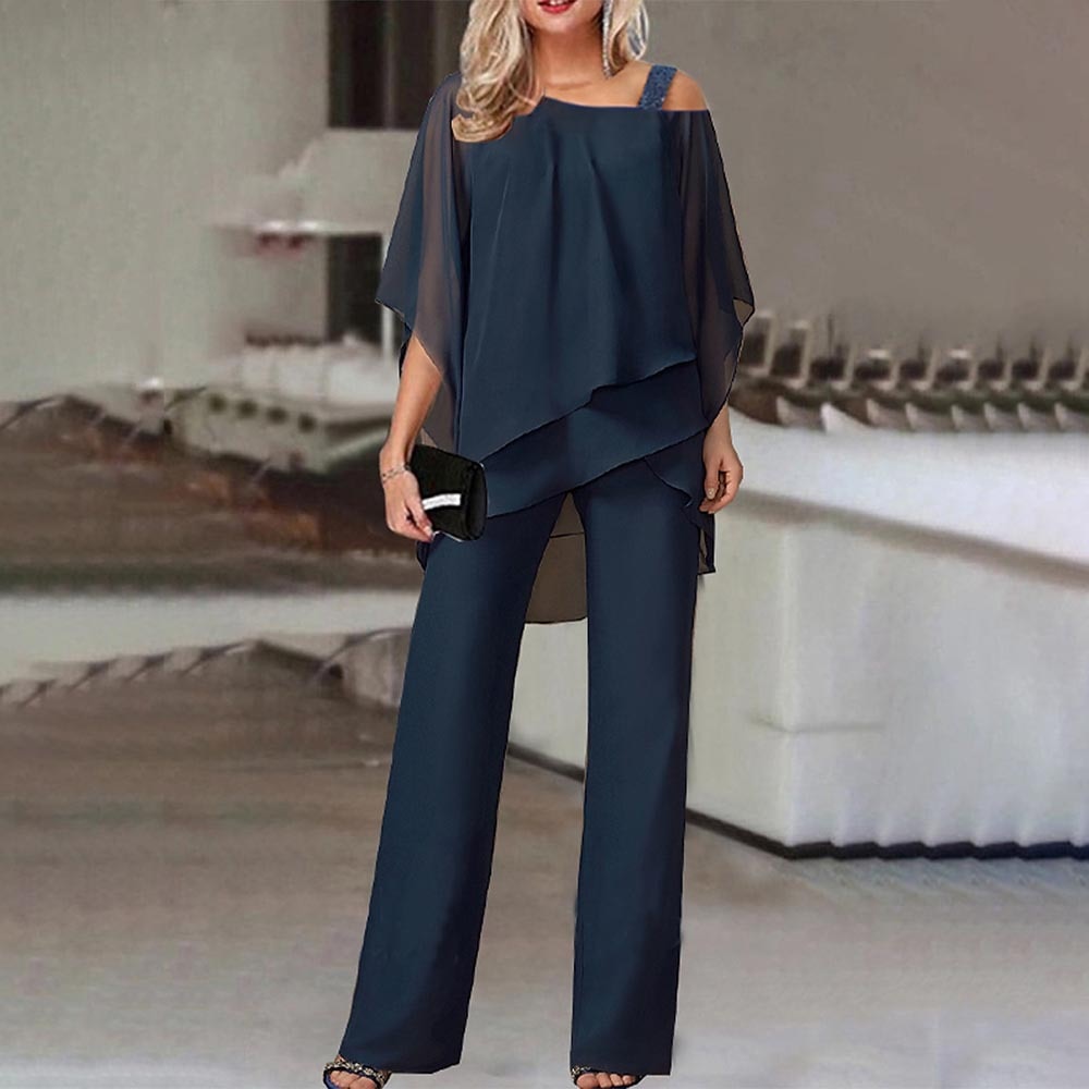 Ravikna Jumpsuit | Elegant todelt plagg med kald skulder