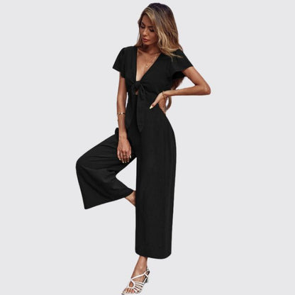 Uformell jumpsuit med slips foran