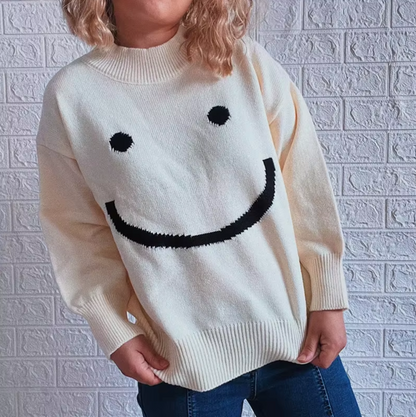 – Strikket genser med smiley ansikt