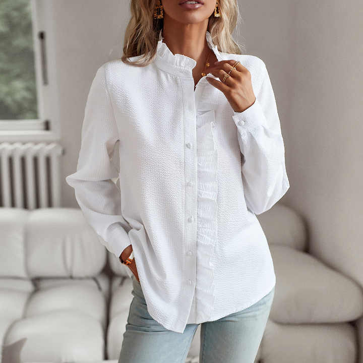 Designet elegant bluse med lange ermer